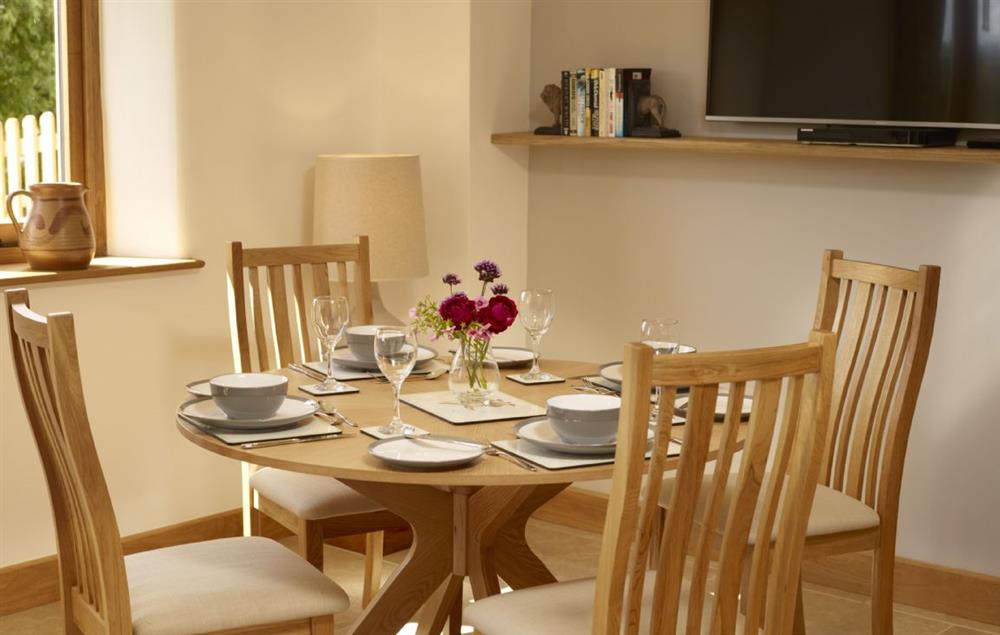 Stylish dining area for four guests at Goose Run Cottage, Corscombe