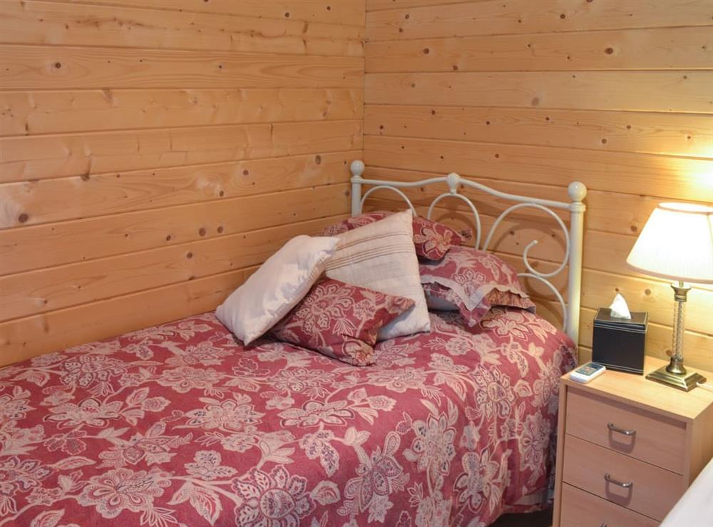 Comfortable bedroom at Gooseberry Lodge in Tollard Royal, near Salisbury, Wiltshire