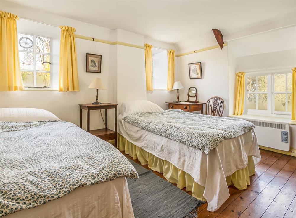 Twin bedroom at Gore Cottage in West Milton, Bridport, Dorset