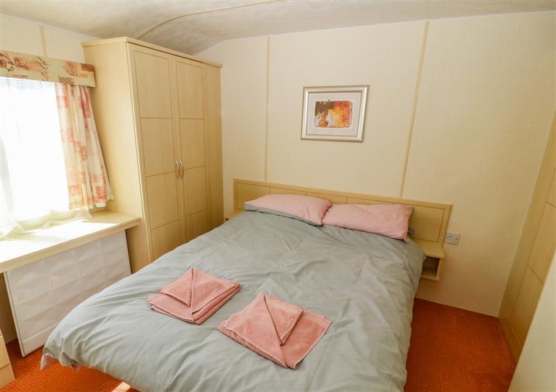 One of the 2 bedrooms at Gorphwysfa Caravan, Tregele near Cemaes Bay