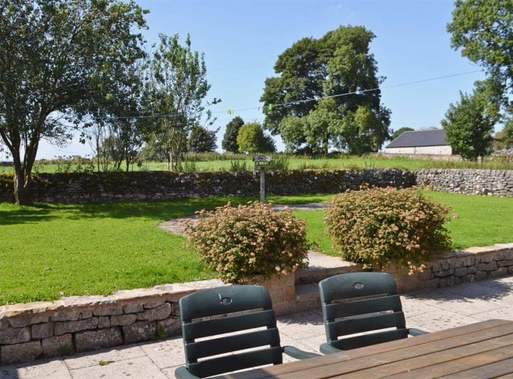 Garden with patio, furniture and barbecue at Goulday in Chelmorton, near Buxton, Derbyshire