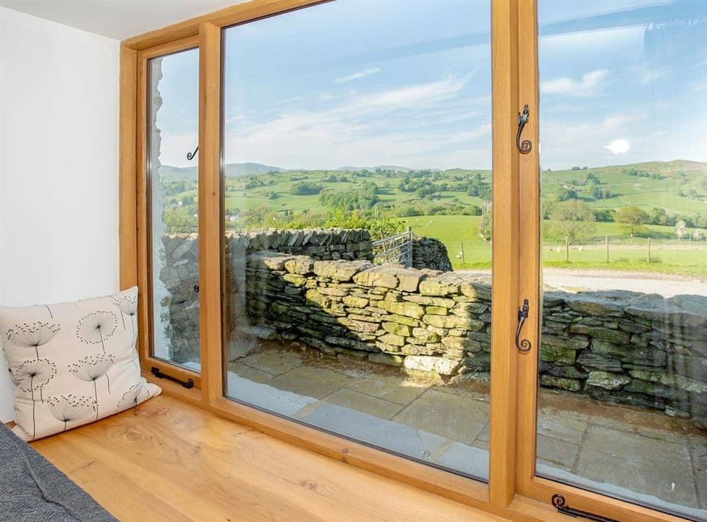 Picture window in sitting room at Stone Barn Cottage, 