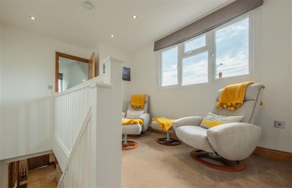 First floor: Landing and reading area at Grace Cottage, Heacham near Kings Lynn