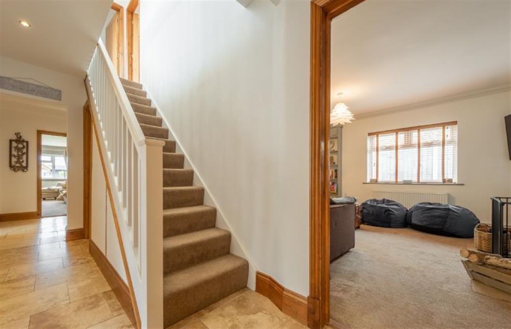 Ground floor:  Hallway and family room with stairs to first floor at Grace Cottage, Heacham near Kings Lynn