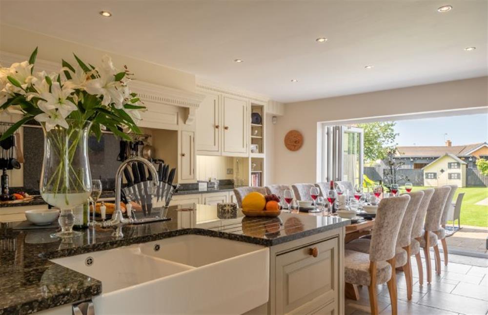 Ground floor: Kitchen and dining area with seating for ten at Grace Cottage, Heacham near Kings Lynn