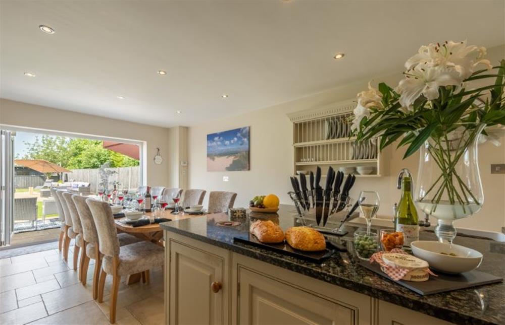 Ground floor: The light and airy kitchen/dining room with direct access to the enclosed garden at Grace Cottage, Heacham near Kings Lynn
