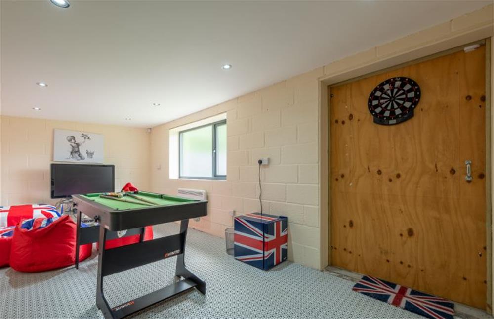 Outside: Adults will also enjoy the well-equipped games room at Grace Cottage, Heacham near Kings Lynn