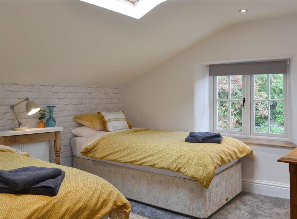 Comfortable twin bedroom at Grace Cottage in High Bickington, near Great Torrington, Devon