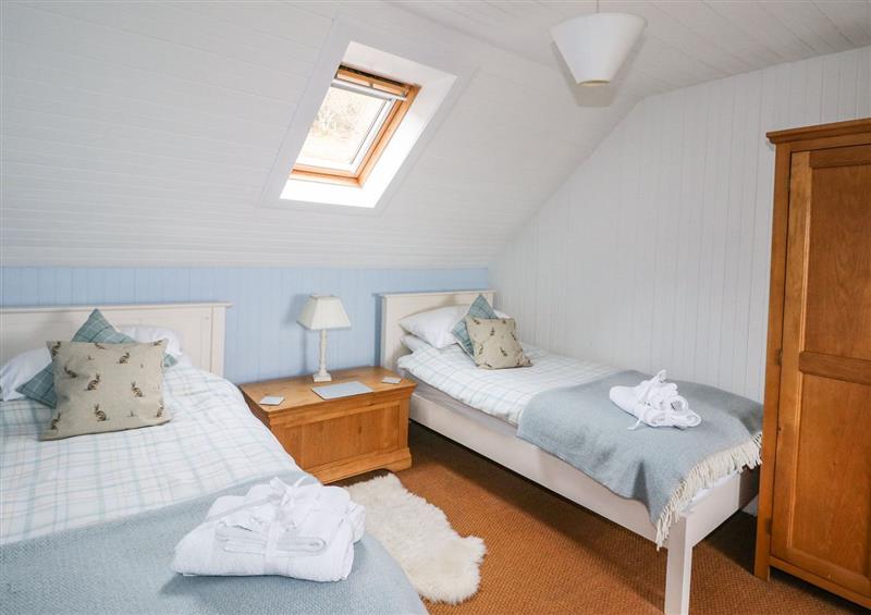 One of the 2 bedrooms at Gramarye Cottage, Peinchorran near Portree