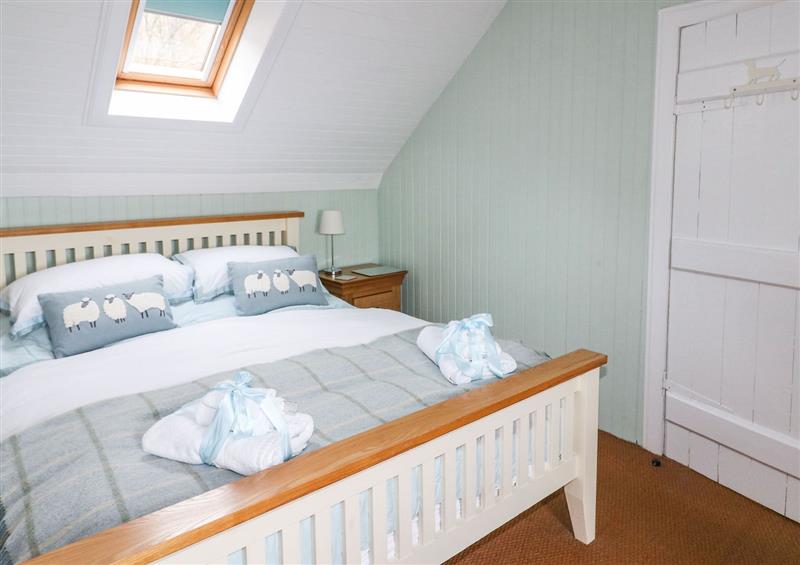 This is a bedroom (photo 2) at Gramarye Cottage, Peinchorran near Portree