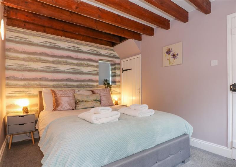 One of the bedrooms at Granary Cottage at The Old Bakehouse, Snettisham