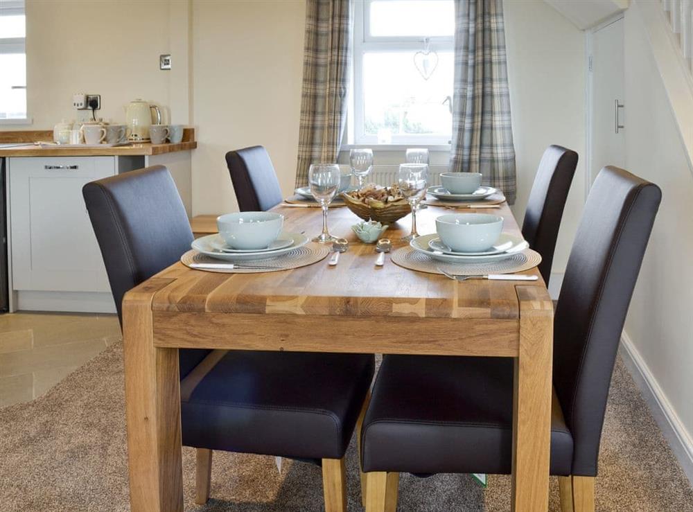 Convenient dining area at Granary Cottage in Bempton, near Bridlington, North Humberside