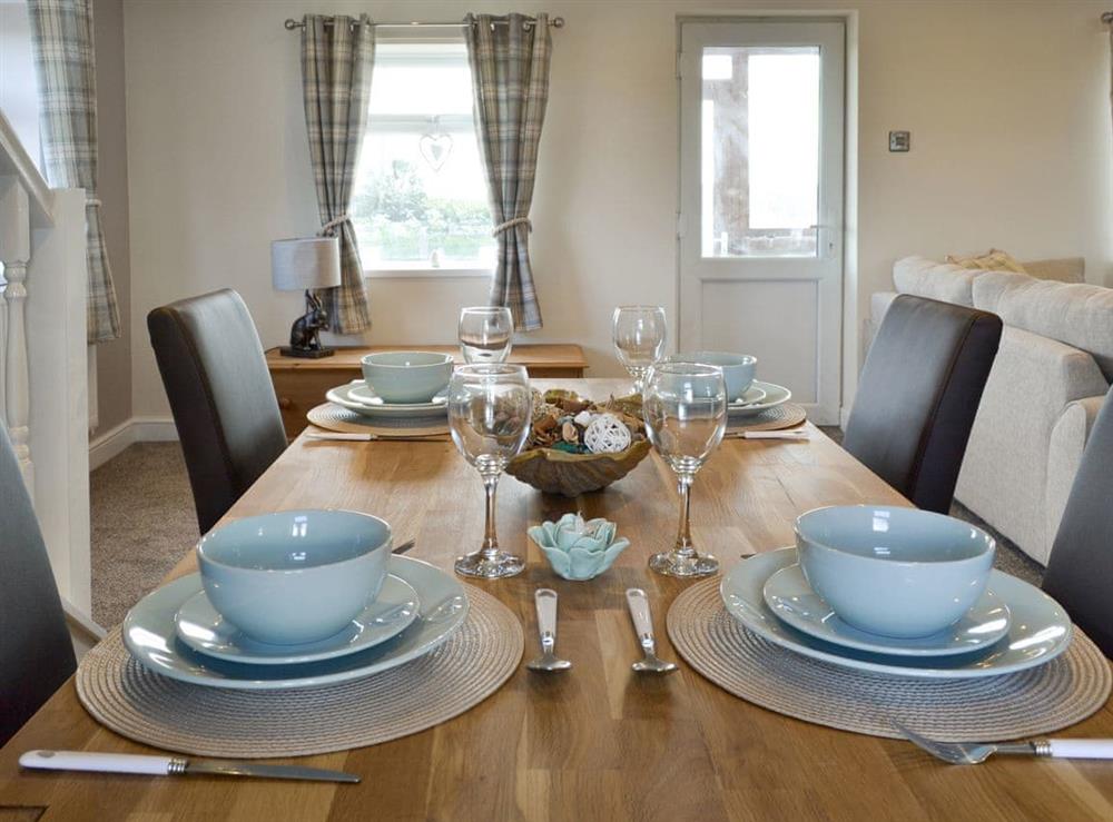 Stylish dining area at Granary Cottage in Bempton, near Bridlington, North Humberside