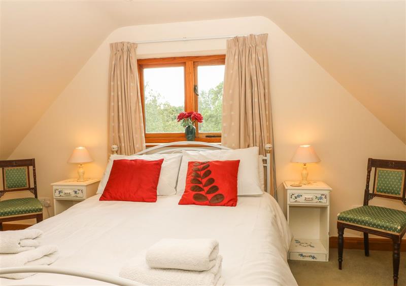 A bedroom in Granary Cottage at Granary Cottage, Blackwell