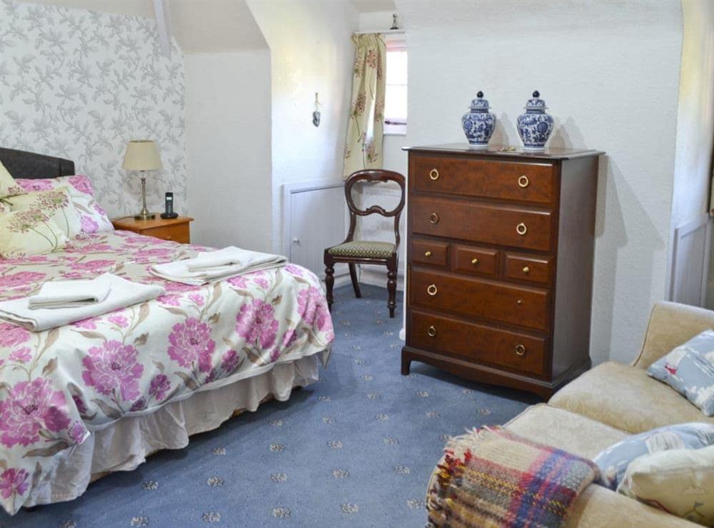 Double bedroom at Granary Cottage in Cockington, near Torquay, Devon