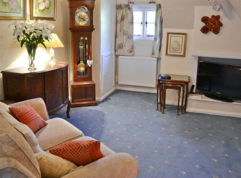 Living room at Granary Cottage in Cockington, near Torquay, Devon