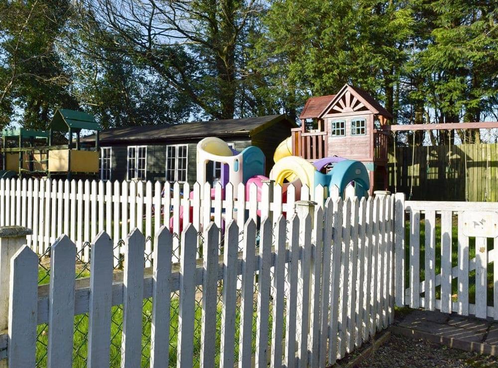 Children’s play area at Granary Cottage in Ivy Court Cottages, Llys-y-Fran, Dyfed