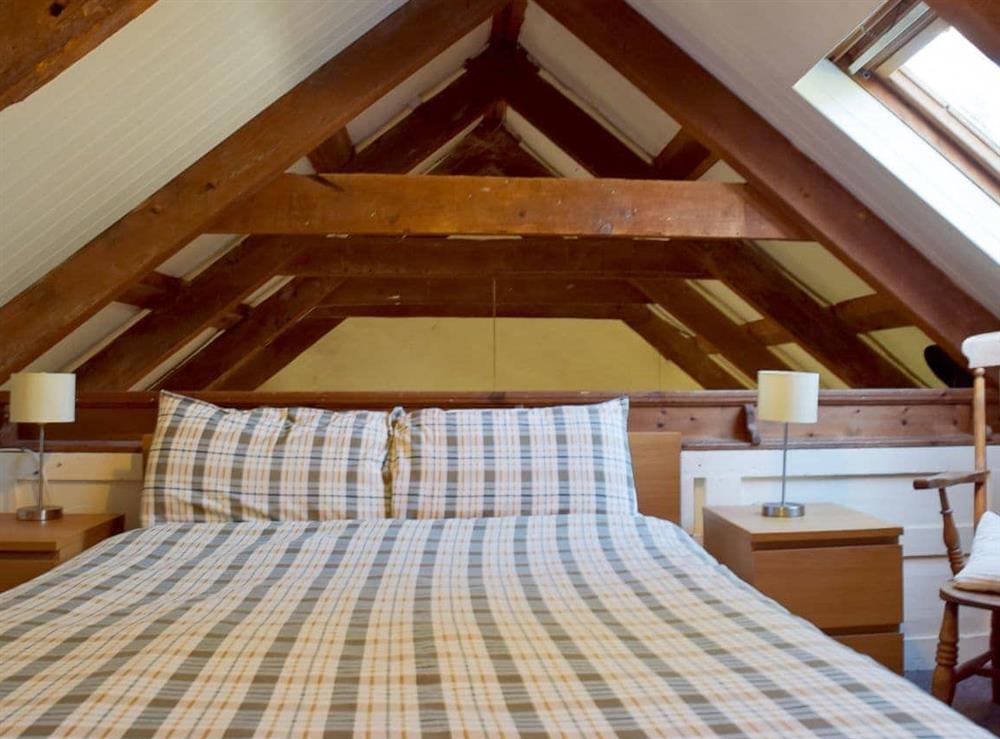 Galleried double bedroom at Granary Cottage in Ivy Court Cottages, Llys-y-Fran, Dyfed
