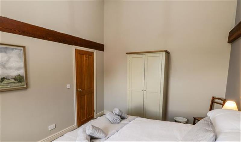 A bedroom in Granary Loft at Granary Loft, West Ayton