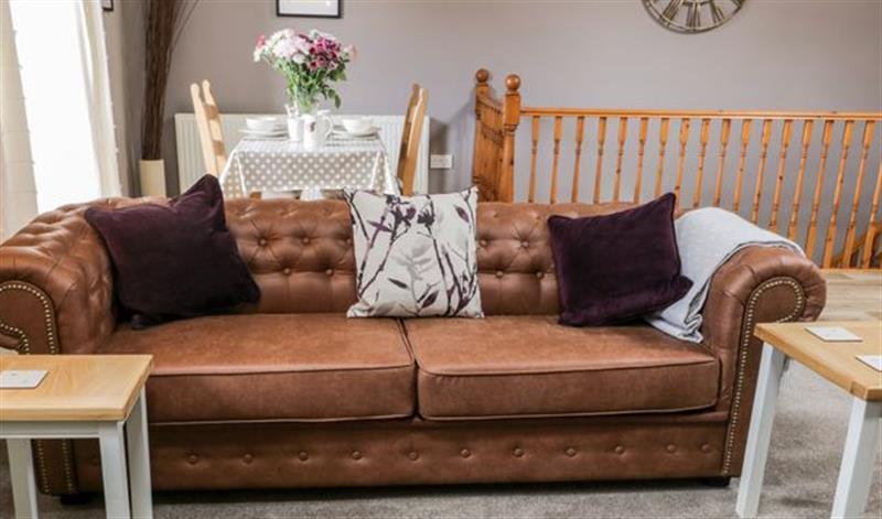 Enjoy the living room at Granary Loft, West Ayton