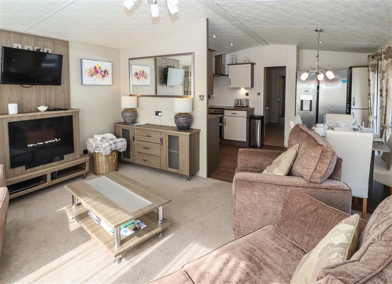Relax in the living area at Grandmas Cottage, South Lakeland Leisure Village near Carnforth