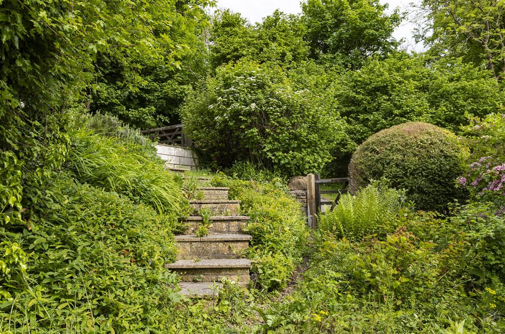 Steep access down to the property from the parking area