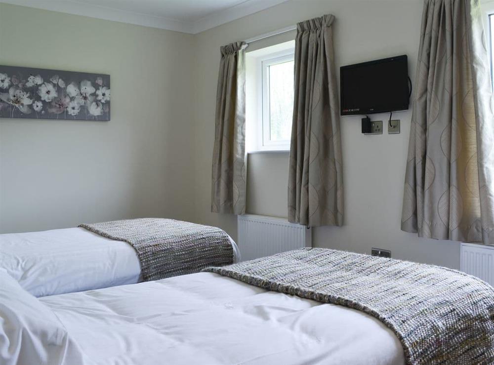 Airy second twin bedroom at Lucys at the Grange, 