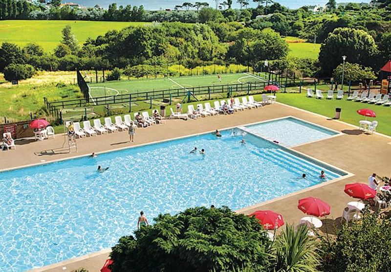 Outdoor heated swimming pool at Grange Court in Devon, South West of England