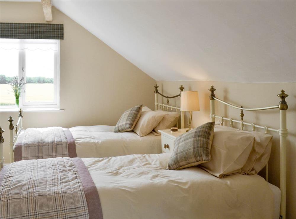 Good-sized twin bedroom at Portington Lodge, 