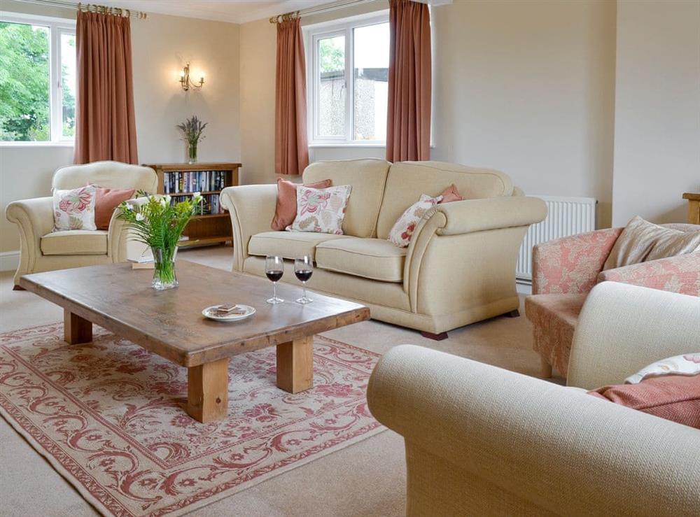 Spacious living room at Portington Lodge, 