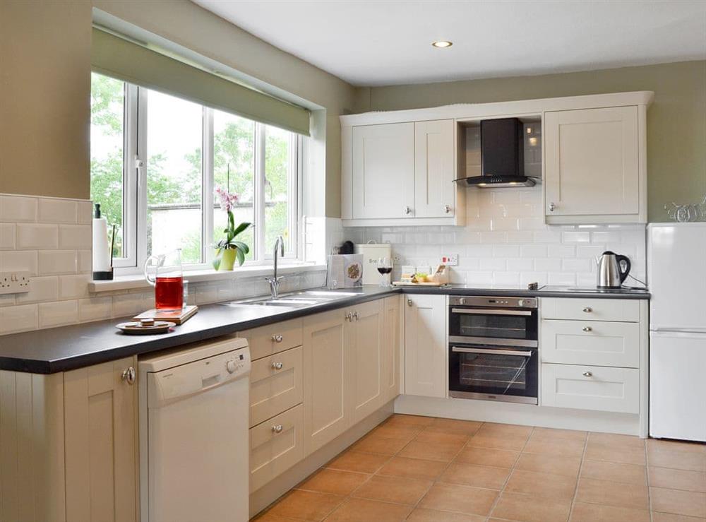 Well-equipped fitted kitchen at Portington Lodge, 