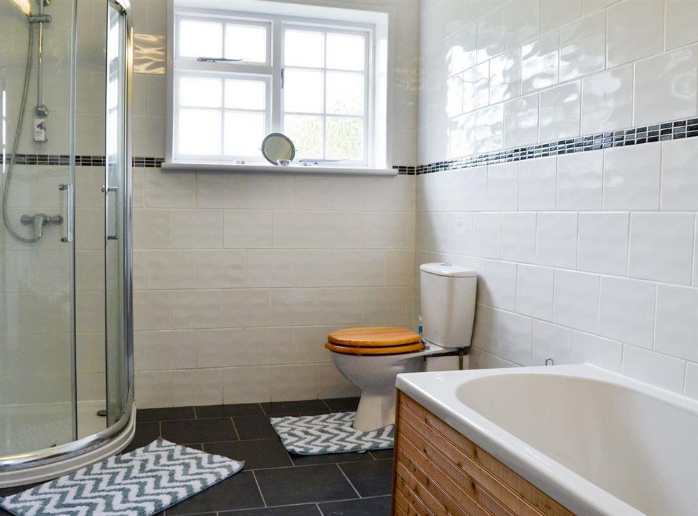 Bathroom with separate shower at Grange Farm House, 