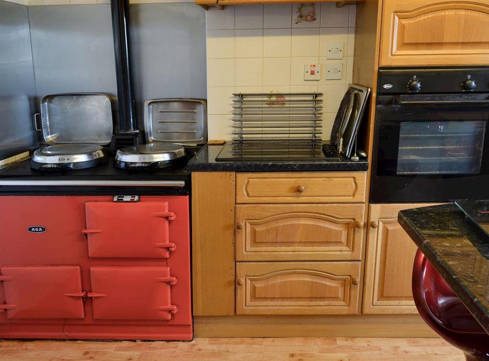 Kitchen with Aga range at Grange Farm House, 