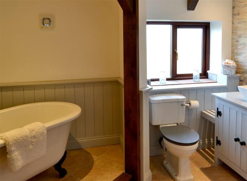 Bathroom with free-standing, claw foot bath (photo 2) at Grange Farmhouse in Hainford, near Aylsham, Norfolk