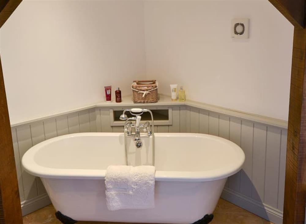 Bathroom with free-standing, claw foot bath (photo 3) at Grange Farmhouse in Hainford, near Aylsham, Norfolk