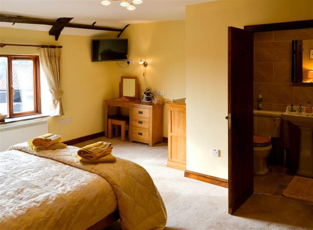 Comfortable bedroom with kingsize bed and en-suite (photo 2) at Grange Farmhouse in Hainford, near Aylsham, Norfolk