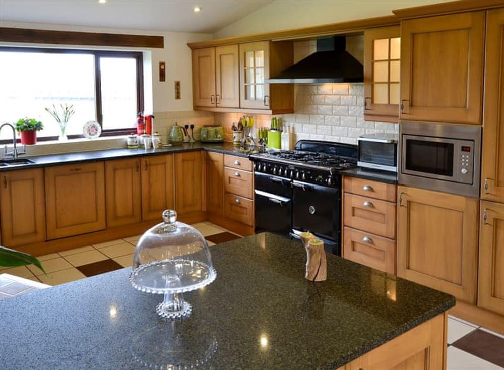 Farmhouse style kitchen with breakfast area (photo 2) at Grange Farmhouse in Hainford, near Aylsham, Norfolk