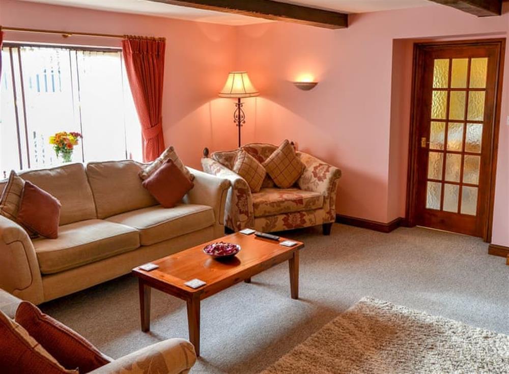 Living room 1 with wood burner (photo 2) at Grange Farmhouse in Hainford, near Aylsham, Norfolk