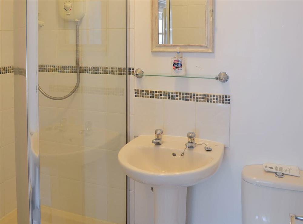 En-suite with shower cubicle at Grange Fell in Grange-over-Sands, Cumbria