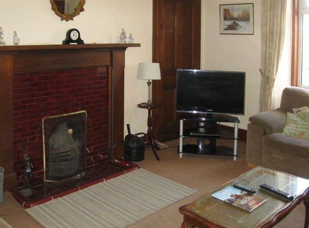 Living room at Granite Cottage in Boat of Garten, near Aviemore, Inverness-Shire