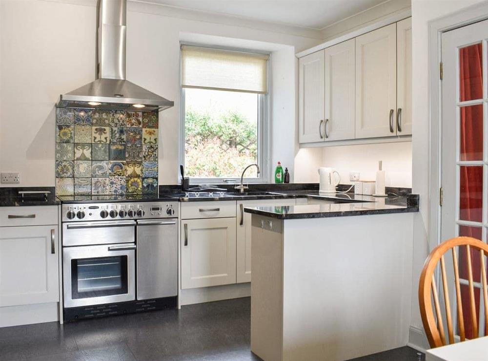 Kitchen at Granite Cottages : Upper Granite Cottage in Nethy Bridge, Inverness-Shire
