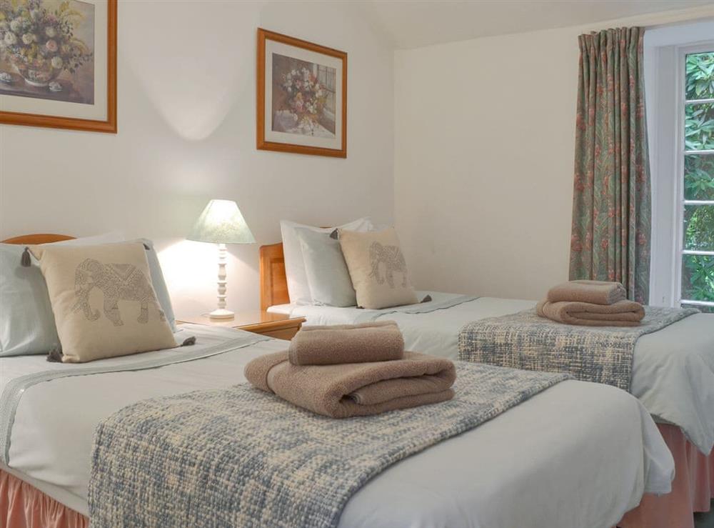 Comfy twin bedroom at Grannys Cottage in Lostwithiel, Cornwall