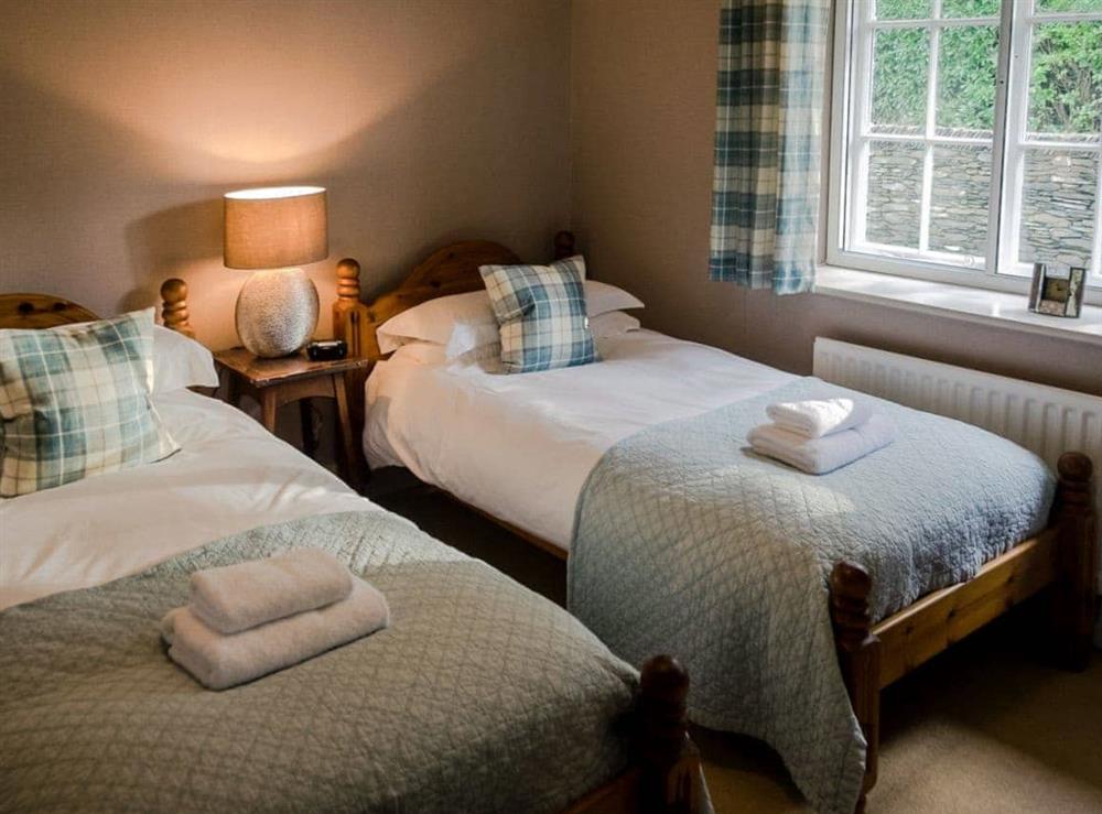 Cosy twin bedroom at Granton Lodge in Bowness-on-Windermere, near Windermere, Cumbria