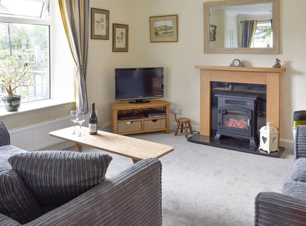 Welcoming living room at Grassgarth Cottage in Redmire, near Leyburn, North Yorkshire