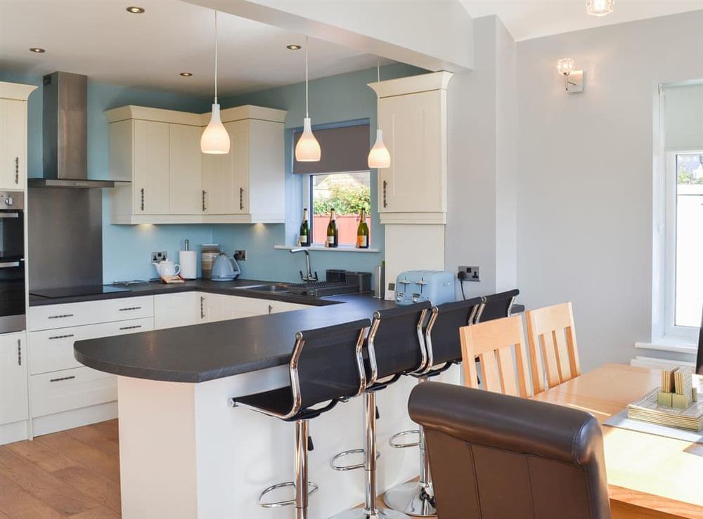 Well appointed kitchen with breakfast bar at Grays Cottage in Bridlington, Yorkshire, North Humberside
