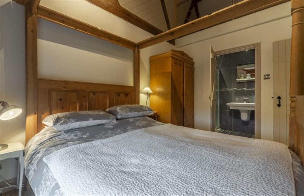 Ground floor: Master bedroom has en-suite shower room at Great Barn, Toftrees near Fakenham