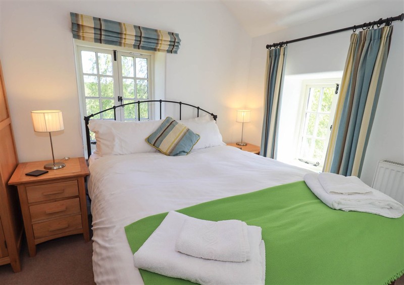 A bedroom in Great Hartbarrow Farm Cottage at Great Hartbarrow Farm Cottage, Cartmel Fell near Windermere