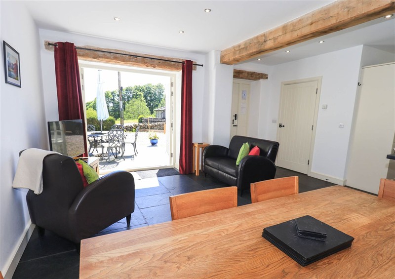 Relax in the living area at Great Hartbarrow Farm Cottage, Cartmel Fell near Windermere