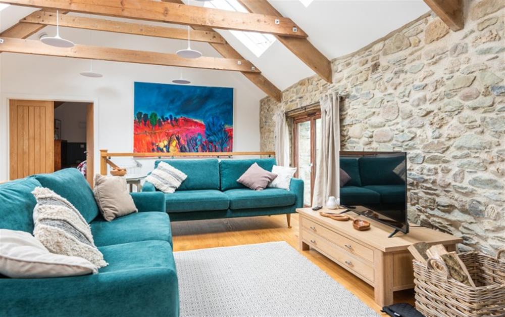 Relax in the living area at Great Palstone Barn in South Brent