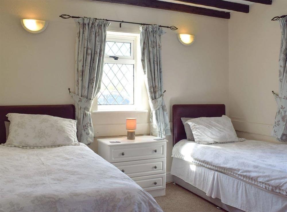 Twin bedroom with beamed ceiling at Green Acre Cottage in Kilgetty, Dyfed , Great Britain